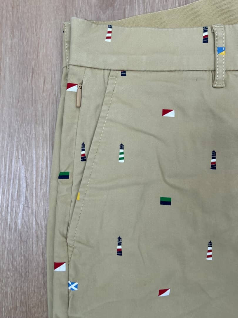 Tommy Hilfiger All over Flag Print Shorts in Beige