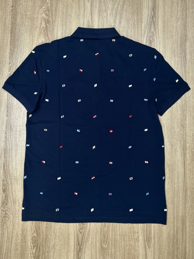 Tommy Hilfiger All over Flag Polo Shirt in Navy
