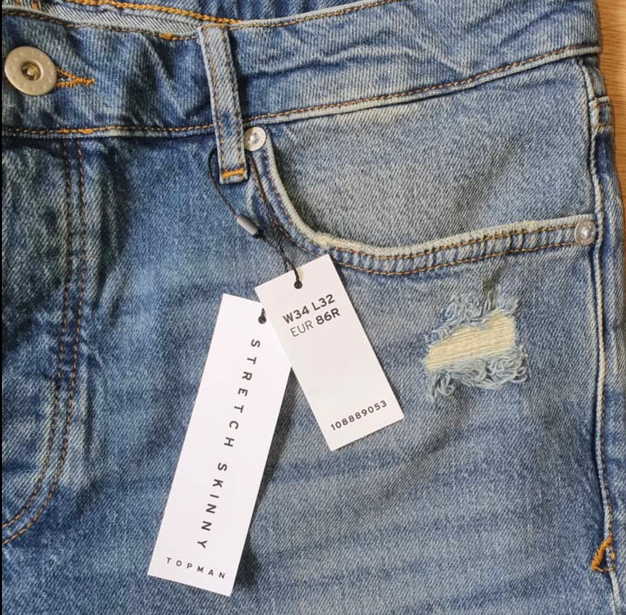 Topman Skinny Fit Ripped Stretch Denim in Blue Wash