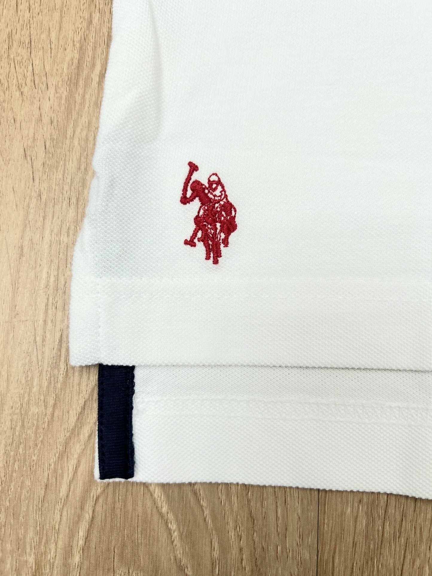 White Pique Polo With a Diagonal Sash