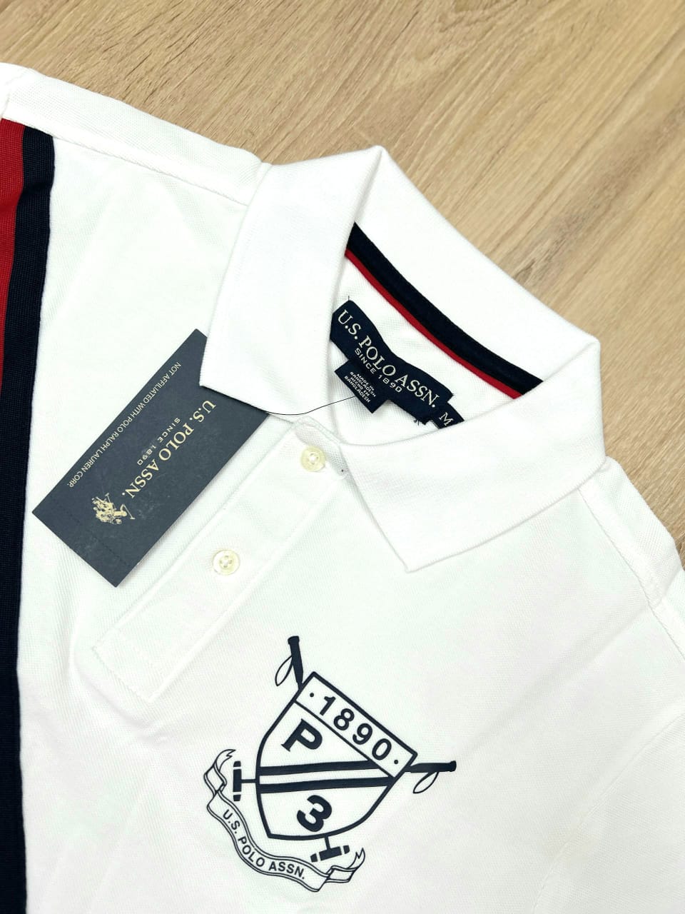 White Pique Polo With a Diagonal Sash
