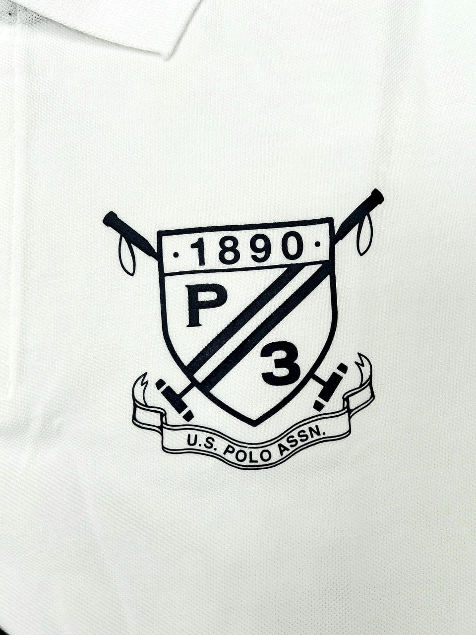 White Pique Polo With a Diagonal Sash